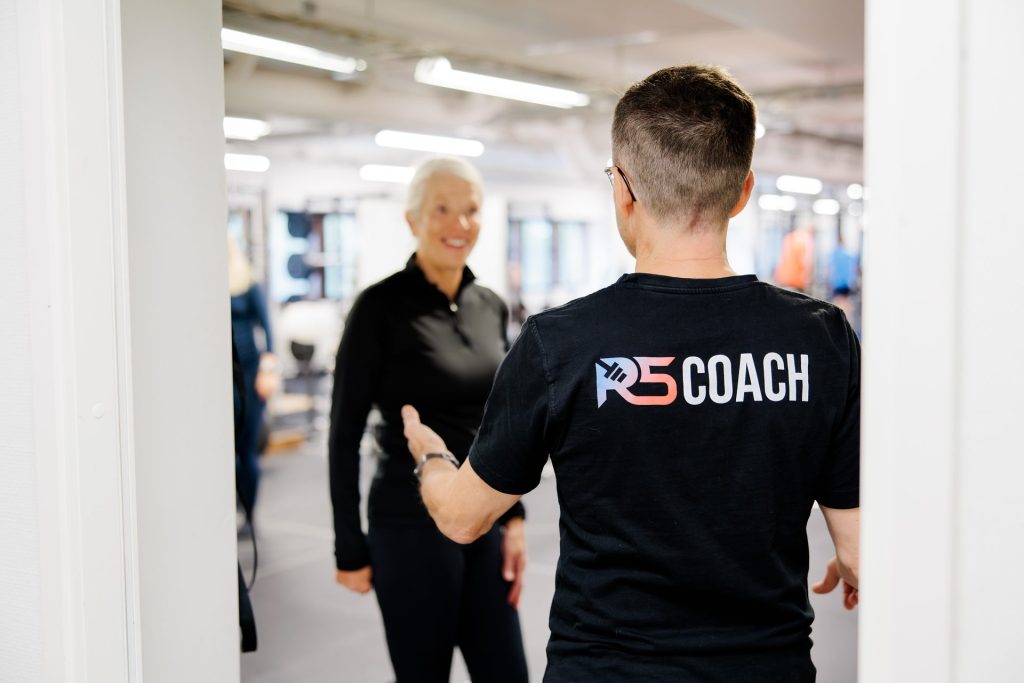 Personal trainer Jerry Ketola welcoming a client to coaching
